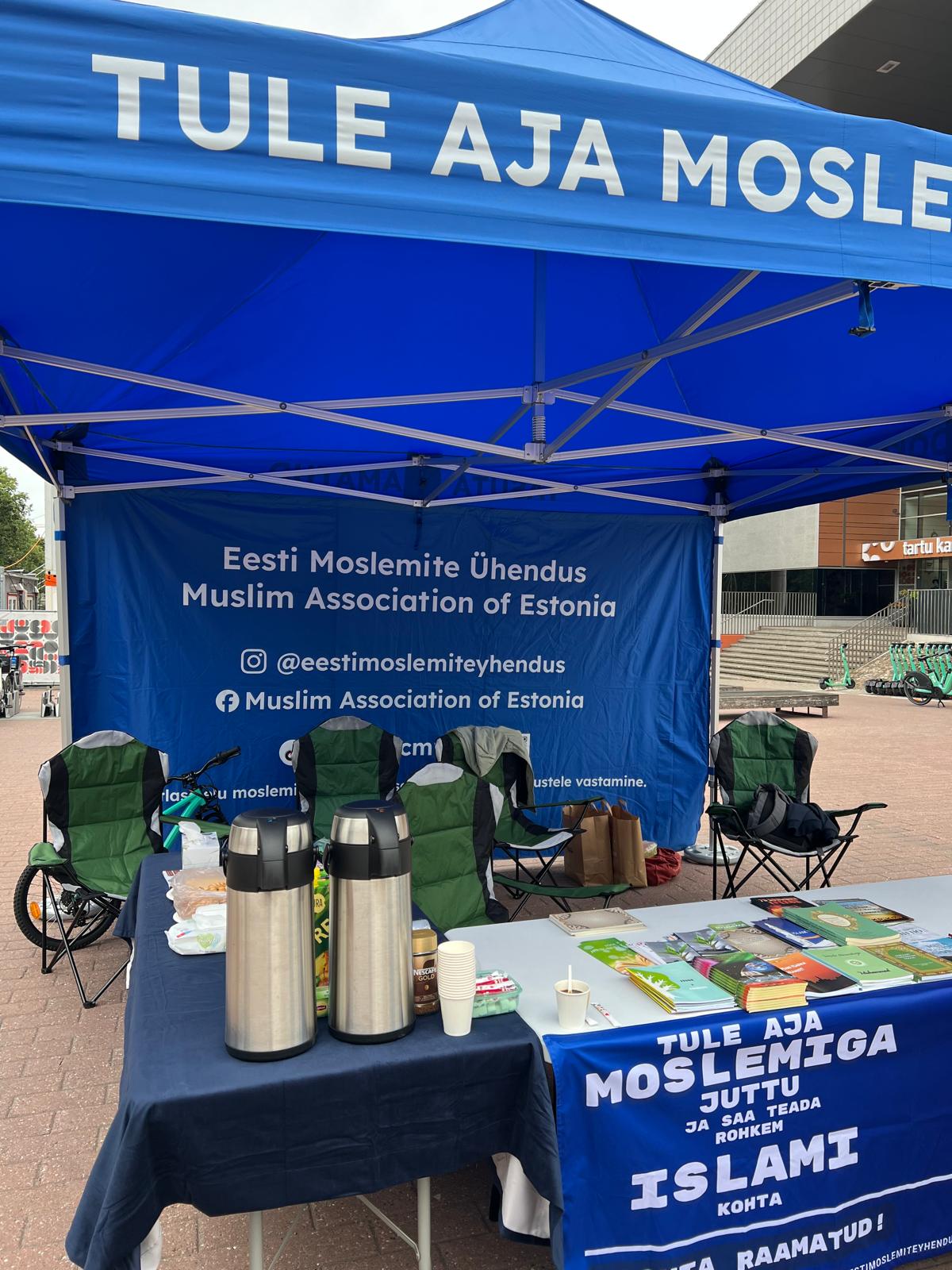 Association outreach tent and book table in Tartu